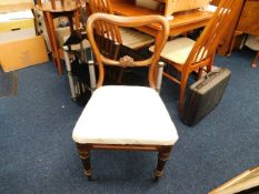 A Victorian dining chair twinned with art deco lam