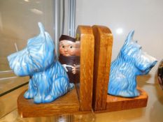 A pair of oak mounted Sylvac dogs as bookends twin