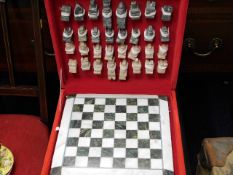 A cased marble chess set