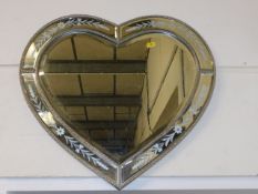 A heart shaped mirror, as new condition