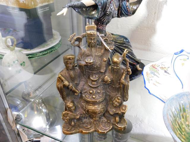 A 19thC. brass Tibetan figure group