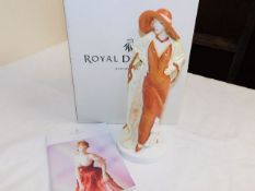 A boxed Doulton figurine Eve