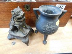 A 20thC. Chinese censer twinned with similar foo d