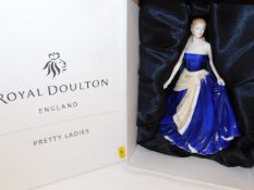 A boxed Doulton figurine Olivia