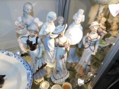 Seven Spanish style porcelain figures