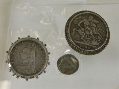 Two silver mounted Victorian coins & a Roman coin