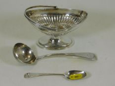 A silver basket with gadrooned sides, a silver sou