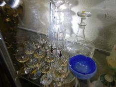 Two decanters, a blue glass bowl & a small quantit