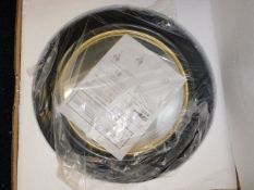 A boxed as new porthole style mirror