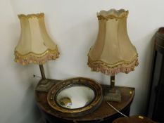 A pair of vintage brass lamps with Corinthian colu