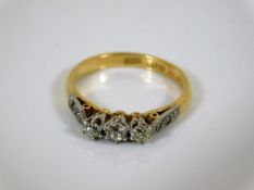 An art deco 18ct gold ring set with diamonds, appr