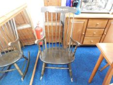 A 20thC. stick back style rocking chair