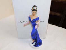 A boxed Doulton figurine Naomi