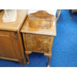 A small bedside pot cupboard