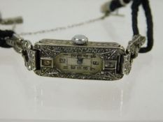 A silver ladies cocktail watch