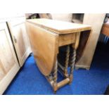 An oak barley twist gateleg table