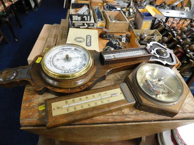 An oak barometer & one other