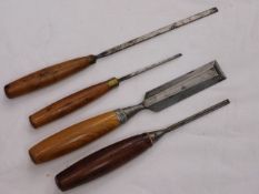 A quantity of vintage wooden handled chisels, seve