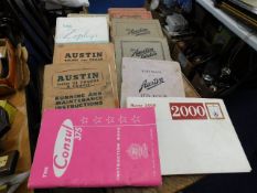 A selection of vintage motoring manuals & ephemera
