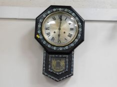 A drop dial wall clock with mother of pearl inlay