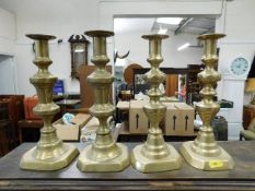 Two pairs of 19thC. brass candlesticks