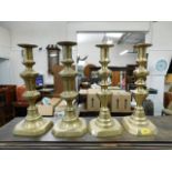 Two pairs of 19thC. brass candlesticks