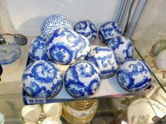 Eleven Oriental porcelain carpet bowls