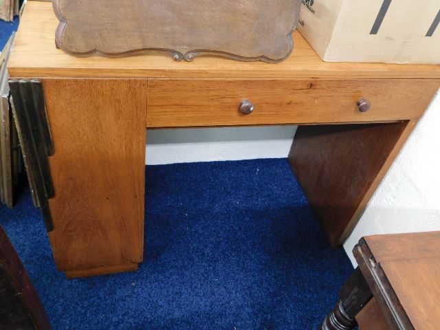 An art deco teak desk with draw & integral bookshe