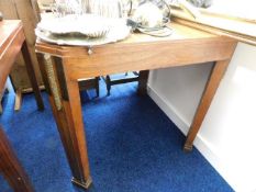 A 1930’s art deco table with later replaced top