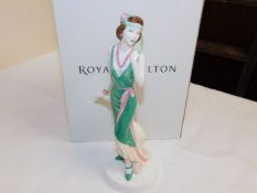 A boxed Doulton figurine Julia