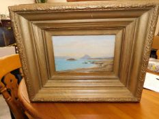 A gilt framed 19thC. painting of beach scene