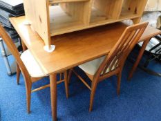 A Danish retro teak dining suite by Koefeds Hornsl