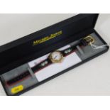 A Michel Jordi boxed watch