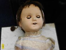 A vintage childs doll a/f