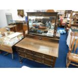 An oak dressing table with mirror with barley twis