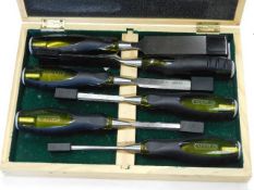A boxed quantity of modern Stanley chisels