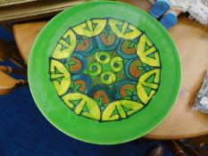 A large Poole pottery charger