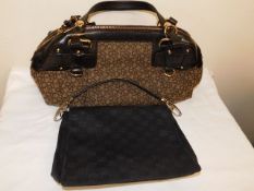 Two DKNY ladies handbags