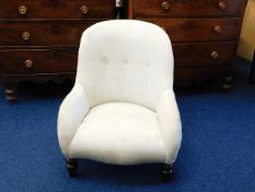A low level Georgian nursing chair upholstered in
