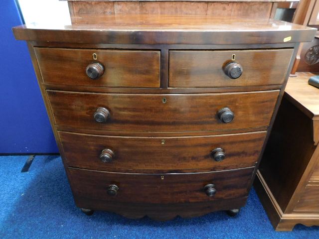 A bow fronted Victorian chest of drawers