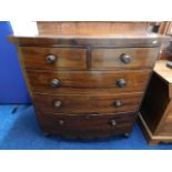 A bow fronted Victorian chest of drawers