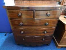 A bow fronted Victorian chest of drawers