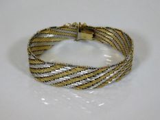 A 9ct gold two tone bracelet