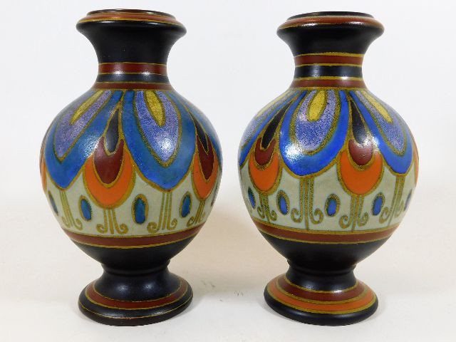 A near pair of Dutch Gouda vases, approx. 8in
