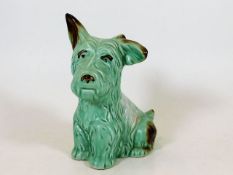 A Sylvac green 1118 pottery dog with brown tipped