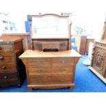 An arts & crafts style mahogany dressing table