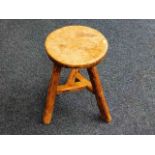 A very rustic farmhouse milking stool