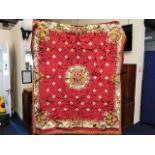 A large vintage throw with two matching pillow cas