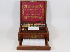 A Victorian G. Rowney & Co. painters box with two