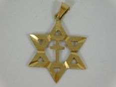 A 9ct gold star & cross pendant